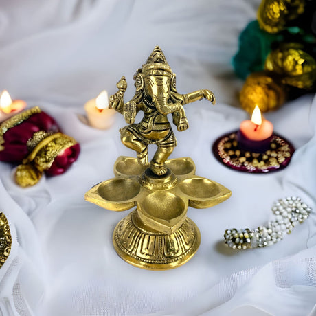 Brass finish dancing ganesha oil diya with base home decor