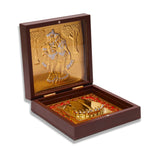 Gold plated radha krishna photo frame with charan paduka