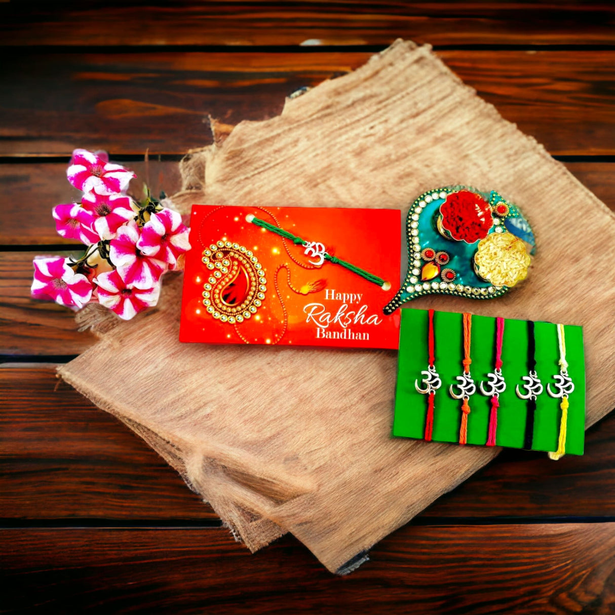 Aum rakhi with card almonds and chocolates for brother om