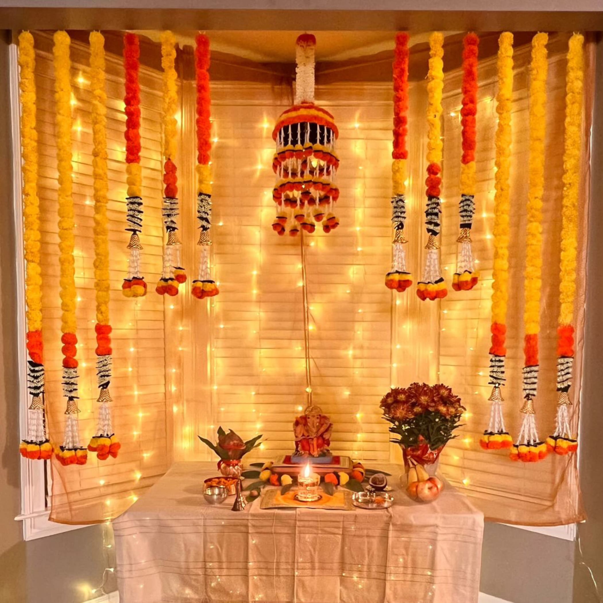 Marigold strings and jhoomar decor with mehndi decoration