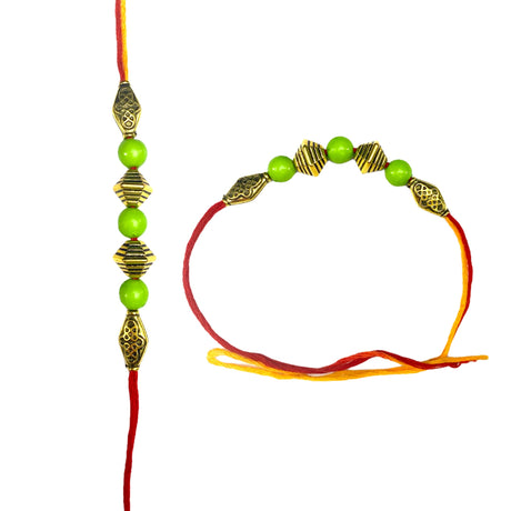 Bead rakhi with card and kumkum roli for brother